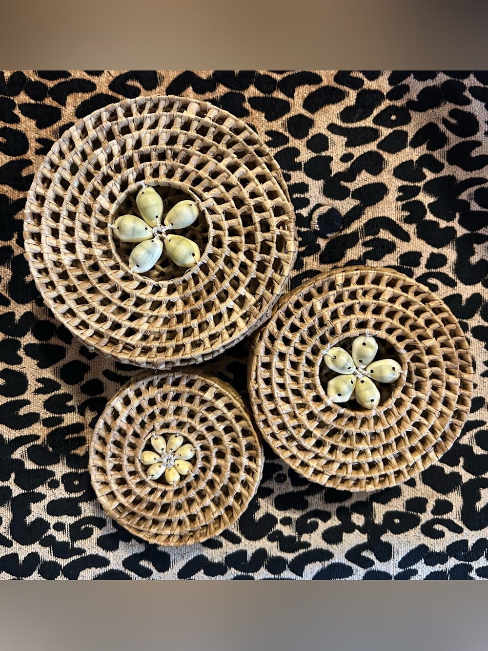 Vintage woven nesting baskets with shells